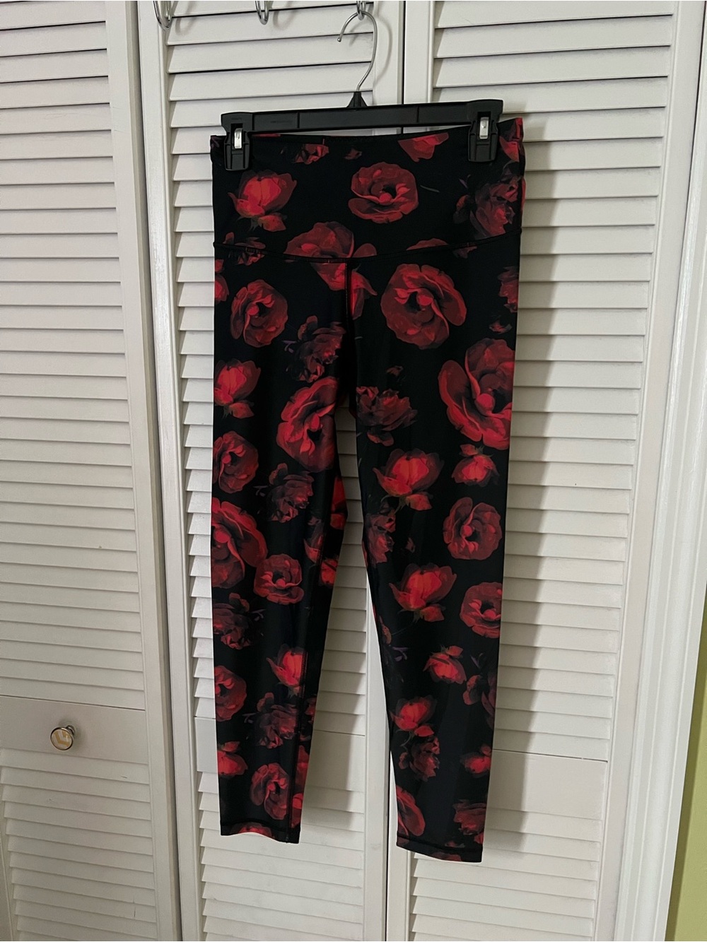 Victoria's Secret Black Leggings with Red Floral Pattern